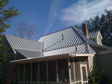 standing seam silver metal roof on traditional house fairfield ct|connecticut metal roofing.